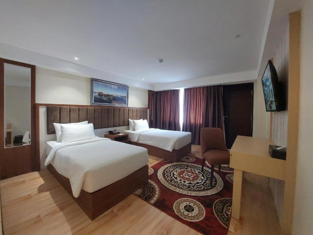 Grand Qin Hotel Banjarbaru Esterno foto